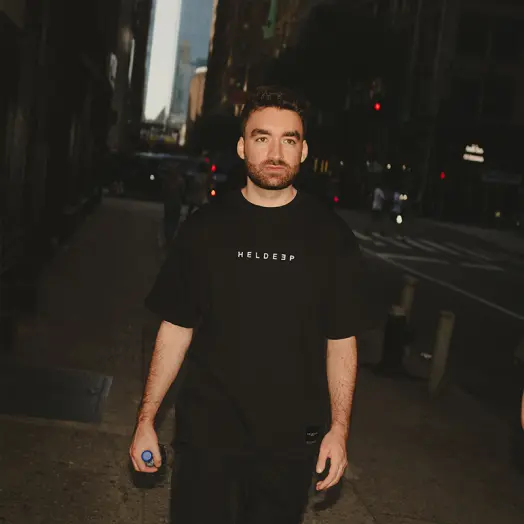 Oliver Heldens wearing OH Collection apparel